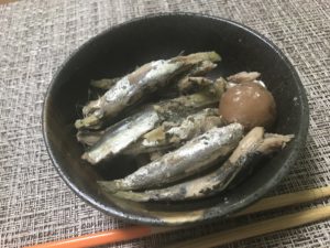 Boiled sardines with plums